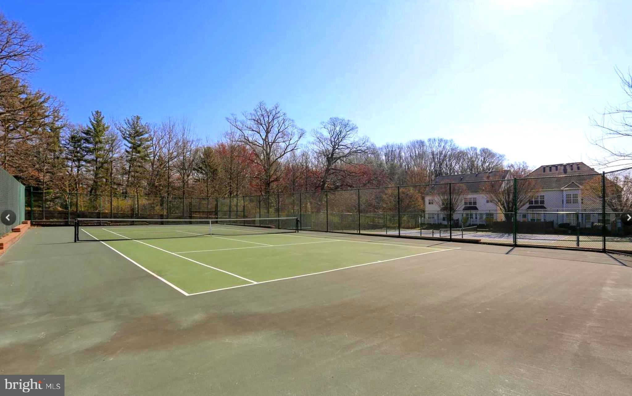 75 Swanton Lane, Unit 200 Gaithersburg, MD 20878 - Photo 33 of 54 a view of a tennis court