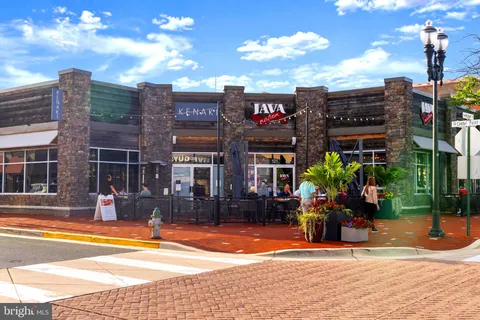 a view of parked car with city street