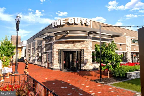 a city street lined with tall buildings