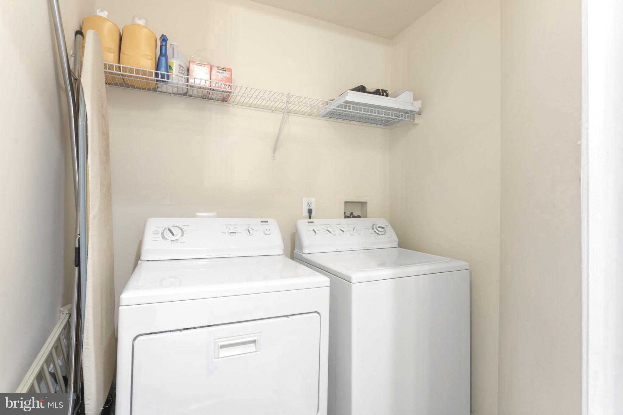 75 Swanton Lane, Unit 200 Gaithersburg, MD 20878 - Photo 9 of 54 a utility room with dryer and washer
