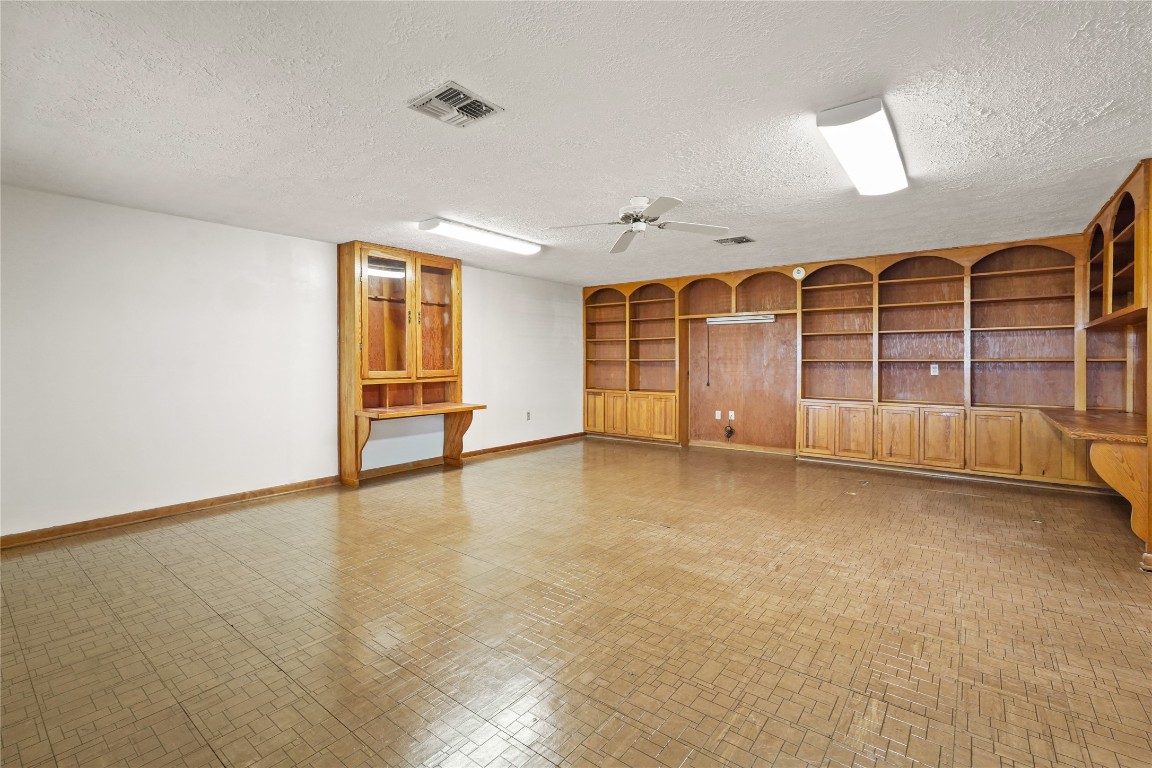 6407 Pleak Road Richmond, TX 77469 - Photo 12 of 22 a view of an empty room with a window