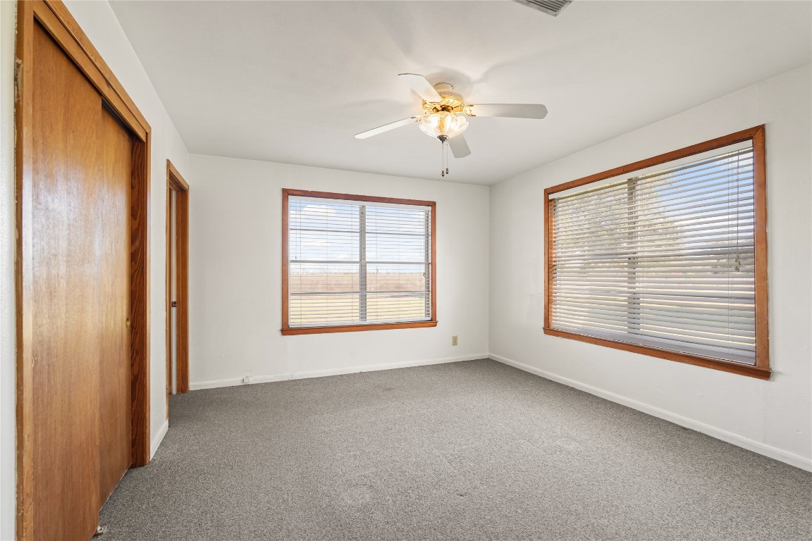 6407 Pleak Road Richmond, TX 77469 - Photo 14 of 22 a view of an empty room with a window