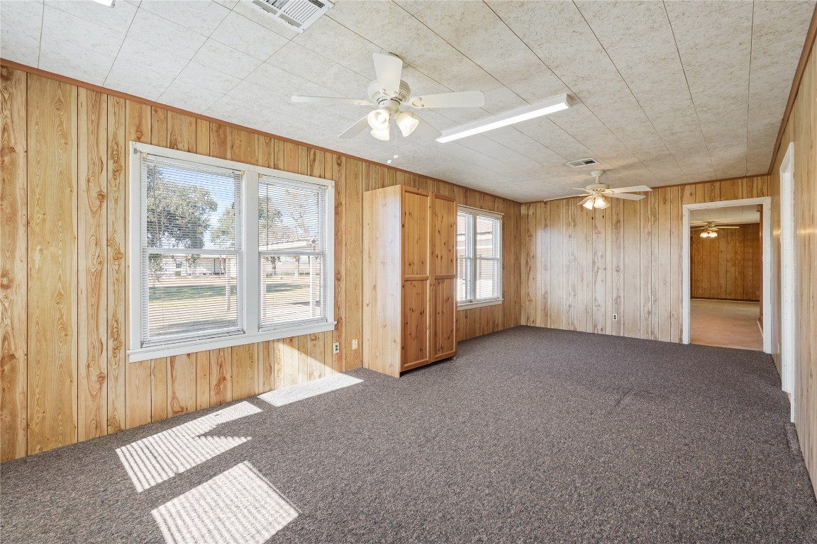 6407 Pleak Road Richmond, TX 77469 - Photo 7 of 22 a view of an empty room with a window