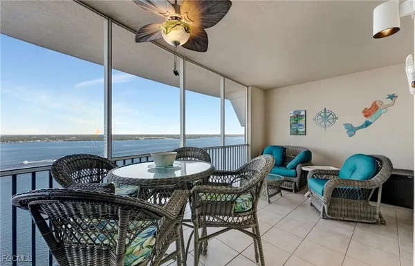 a view of a dining room with furniture window and outside view