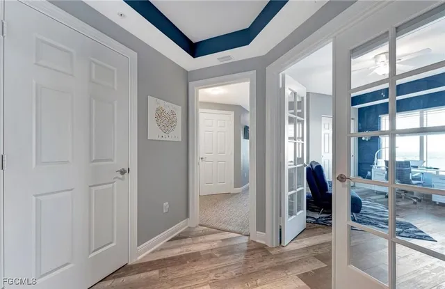 wooden floor and dining room with furniture