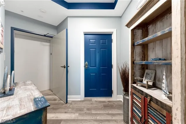 a bedroom with a bed and a cabinets