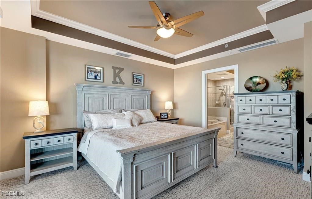 2745 First Street, Unit 2602 Fort Myers, FL 33916 - Photo 9 of 29 a bedroom with a bed and a dresser