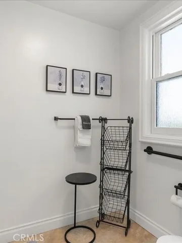 front view of a house with a garden