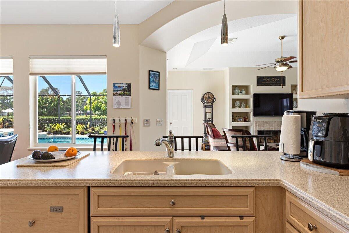 212 Southwest Whitewood Drive Port St. Lucie, FL 34953 - Photo 18 of 26 a view of living room with furniture and flat screen tv