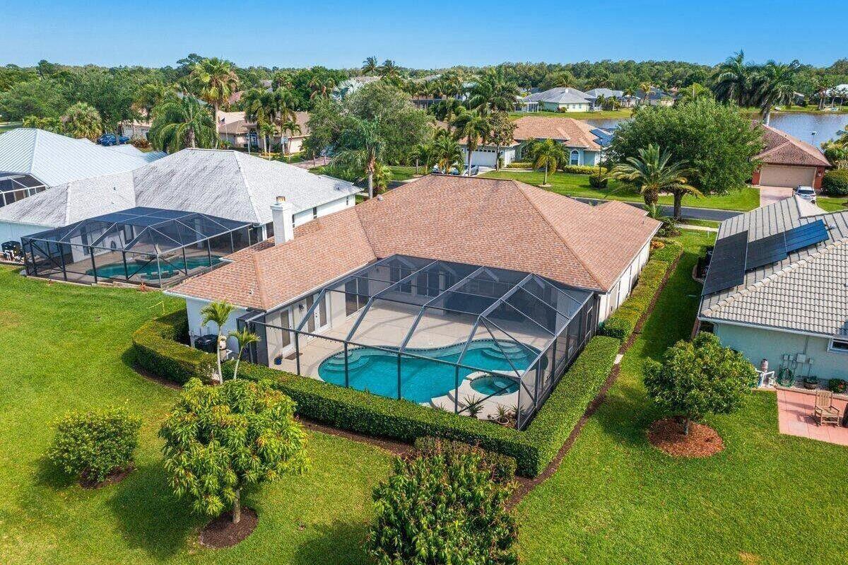 212 Southwest Whitewood Drive Port St. Lucie, FL 34953 - Photo 2 of 26 an aerial view of a house