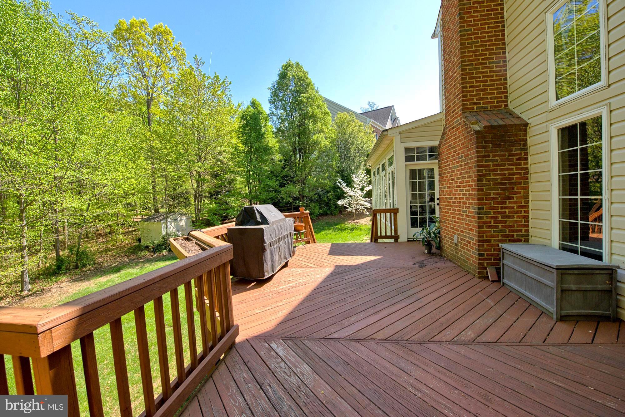21 Hackett Court Poolesville, MD 20837 - Photo 8 of 89 Expansive deck overlooks your private wooded yard