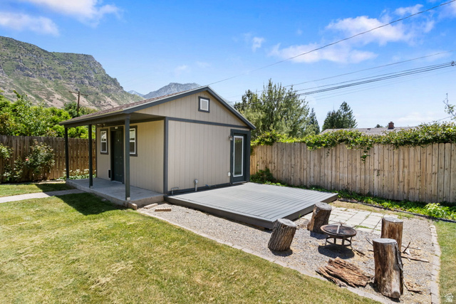 576 East 3950 North Provo, UT 84604 - Photo 41 of 47 Detached outbuilding with covered porch, elevated deck, and gravel patio area