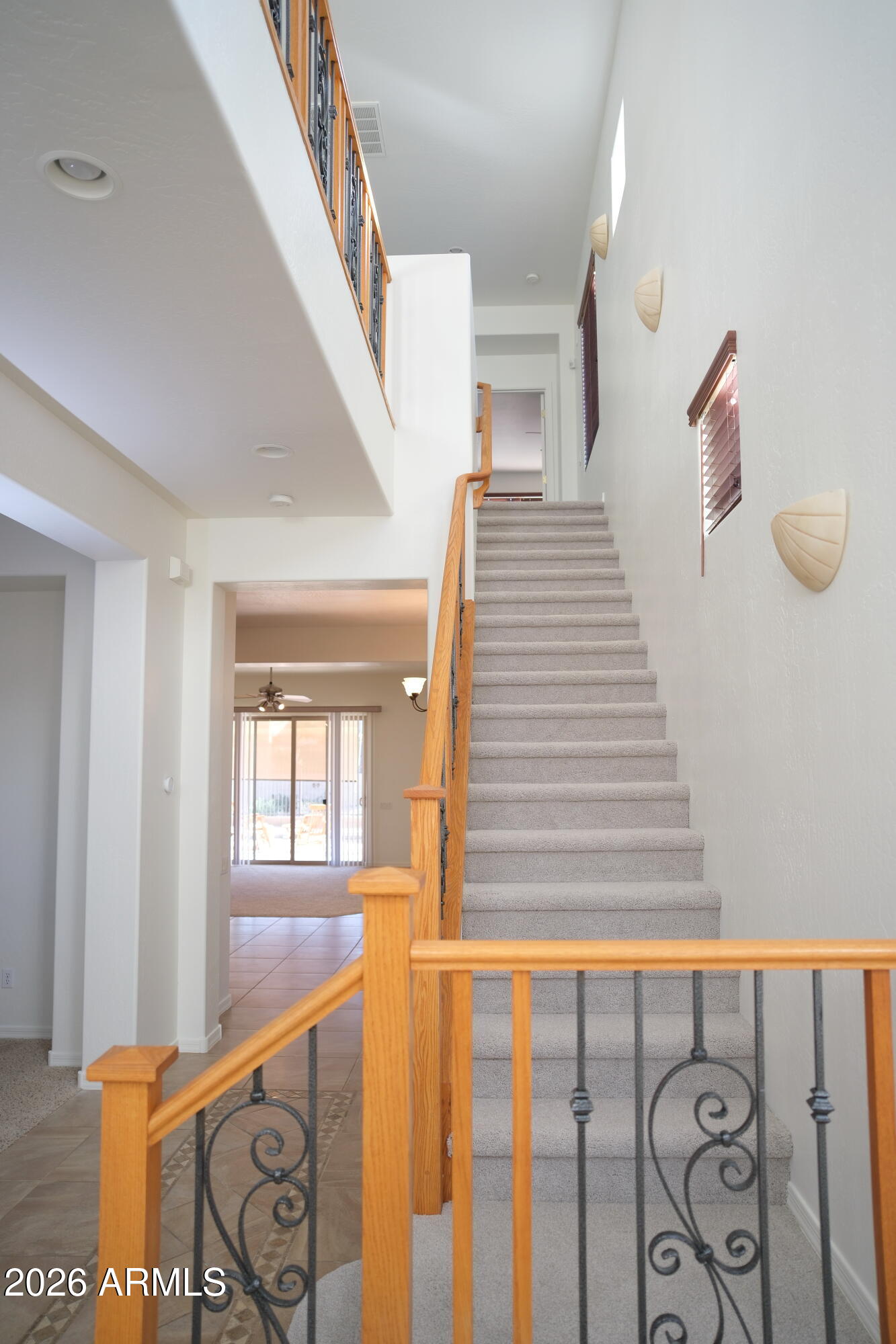 8367 West Briles Road Peoria, AZ 85383 - Photo 16 of 30 a view of entryway and hall with wooden floor