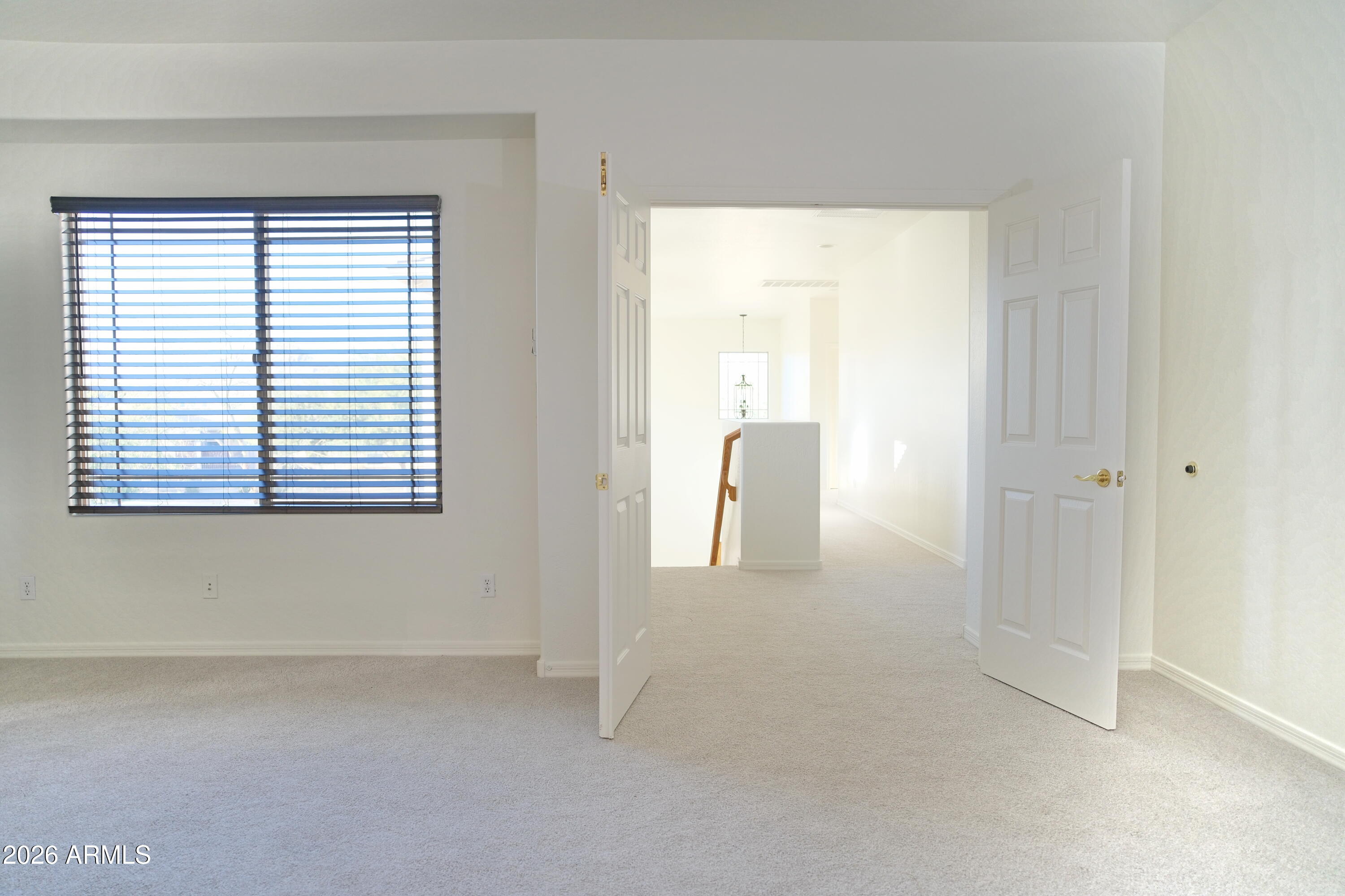 8367 West Briles Road Peoria, AZ 85383 - Photo 21 of 30 an empty room with a window
