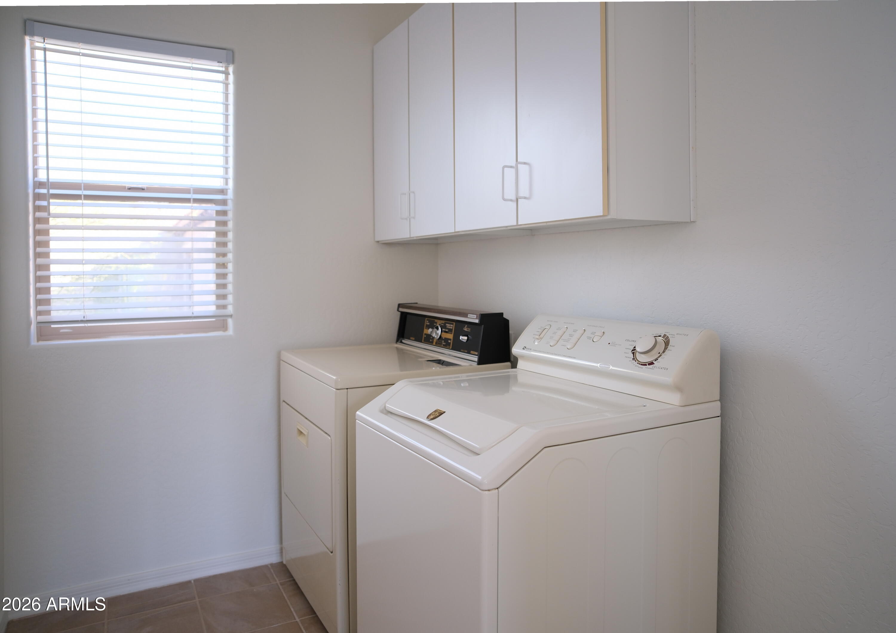 8367 West Briles Road Peoria, AZ 85383 - Photo 28 of 30 a utility room with dryer and washer