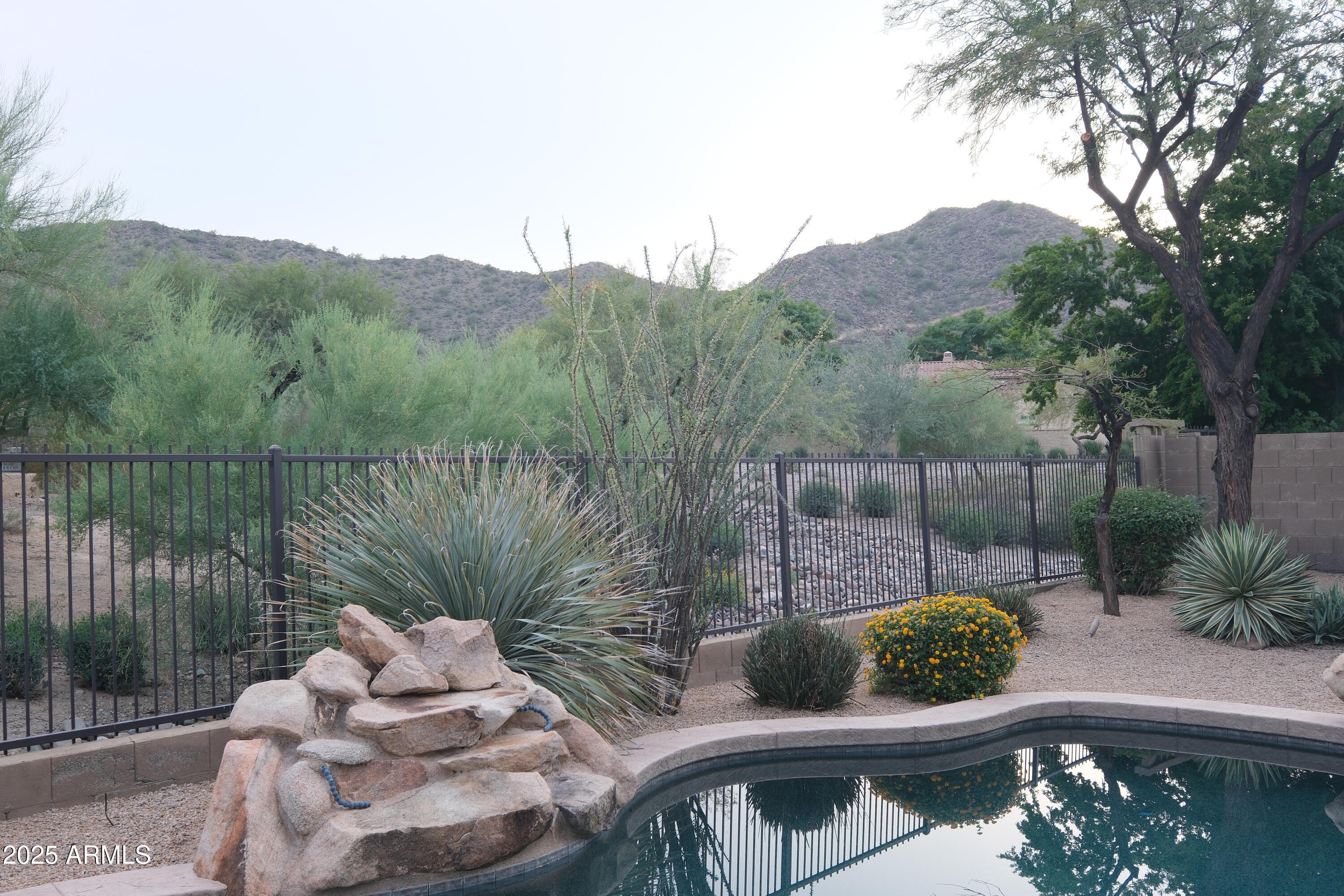 8367 West Briles Road Peoria, AZ 85383 - Photo 6 of 30 a view of a chair in a patio