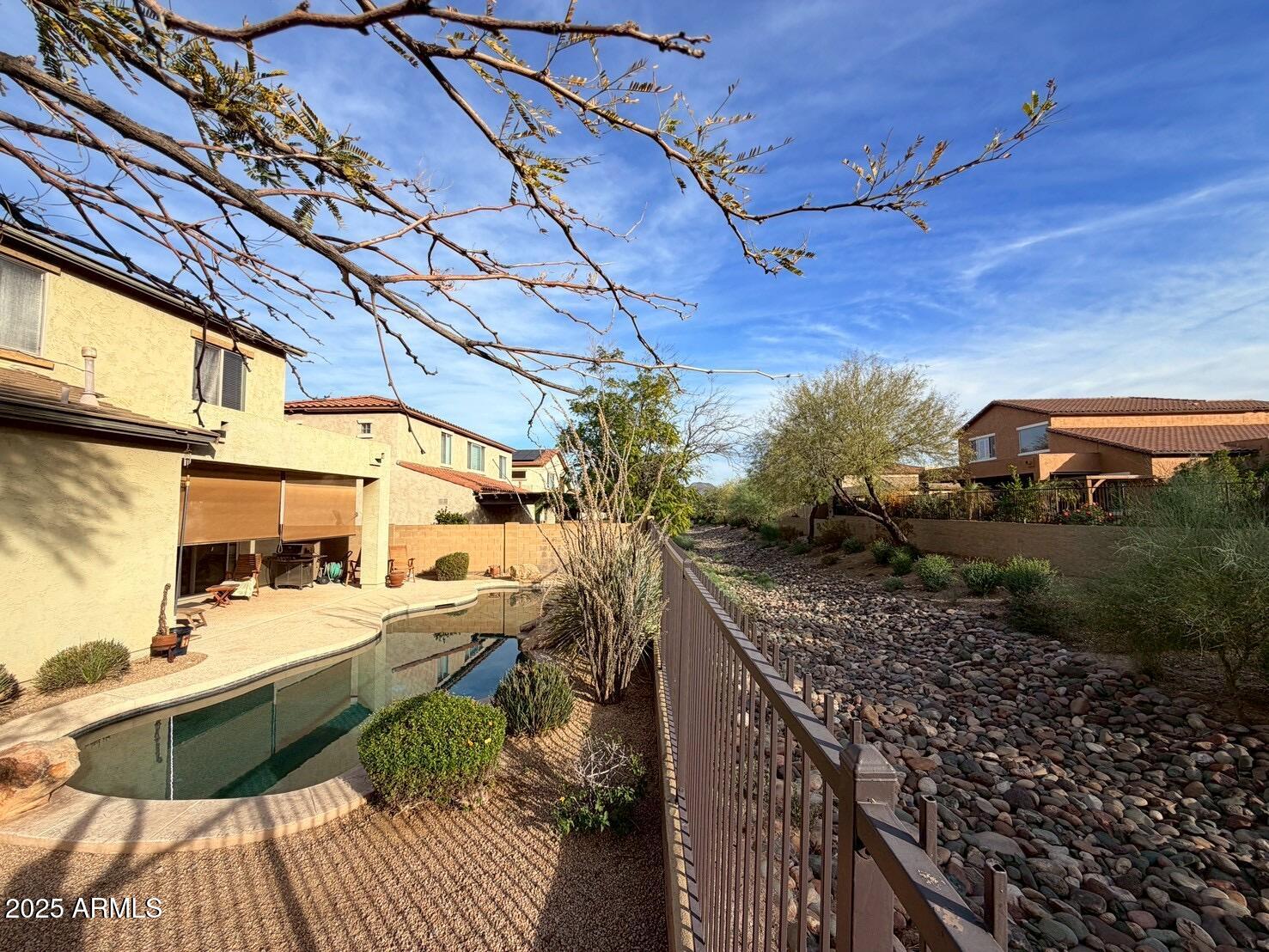 8367 West Briles Road Peoria, AZ 85383 - Photo 8 of 30 a view of a backyard with sitting area