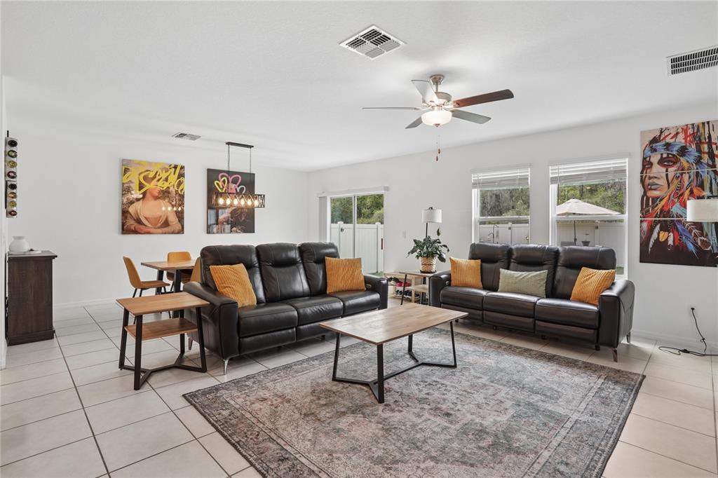 1718 Red Loop Lakeland, FL 33801 - Photo 14 of 25 a living room with furniture and a rug