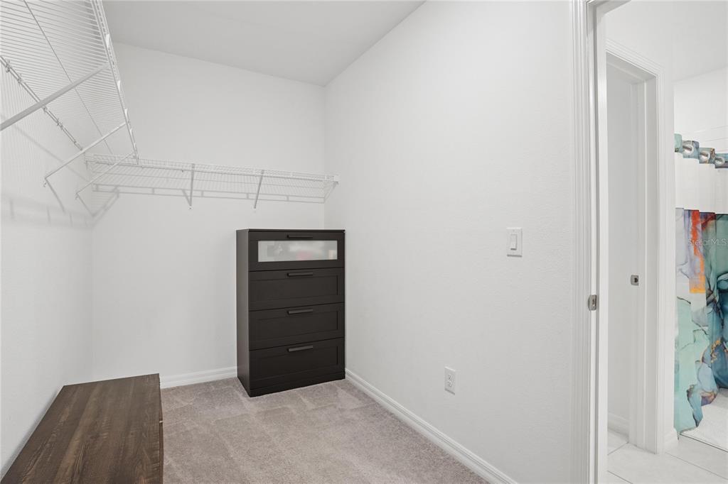 1718 Red Loop Lakeland, FL 33801 - Photo 9 of 25 a view of an empty walk in closet