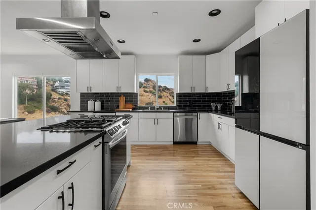 a view of a chairs and table in the terrace