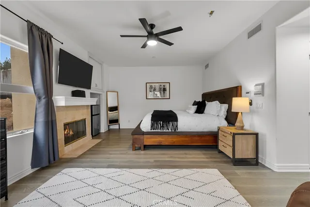 a kitchen with kitchen island a stove a sink and a refrigerator