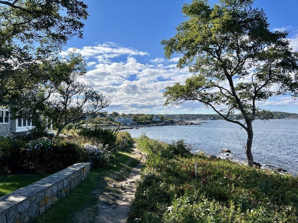 18 Smith Road Rockport, MA 01966 - Photo 22 of 28 a view of a lake with a building in the background