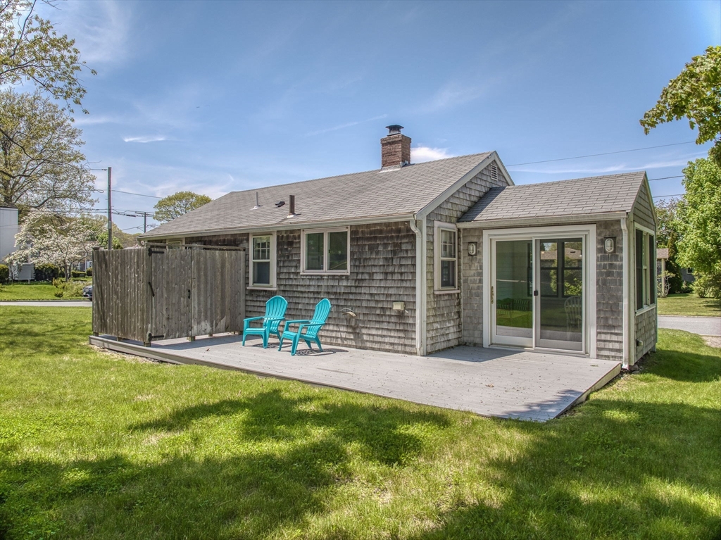 18 Smith Road Rockport, MA 01966 - Photo 6 of 28 a view of a house with a yard and sitting area
