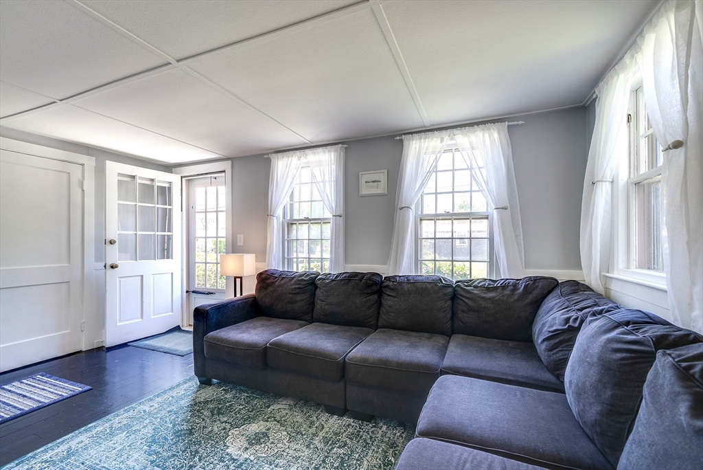 18 Smith Road Rockport, MA 01966 - Photo 10 of 28 a living room with furniture and a window