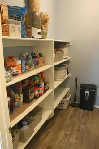 a room with storage and utility