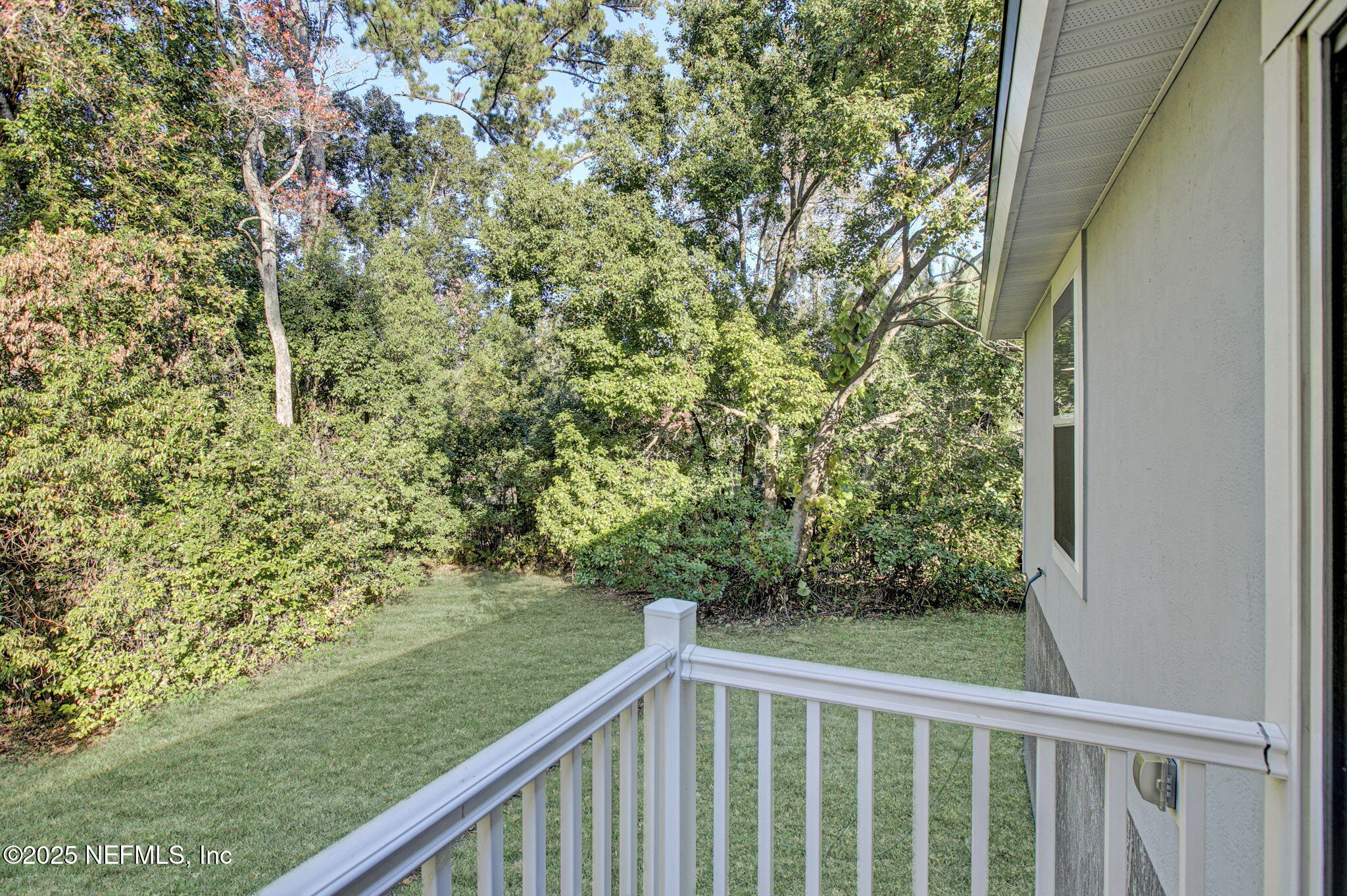 10632 Tulsa Road Jacksonville, FL 32218 - Photo 23 of 25 a view of a forest from balcony