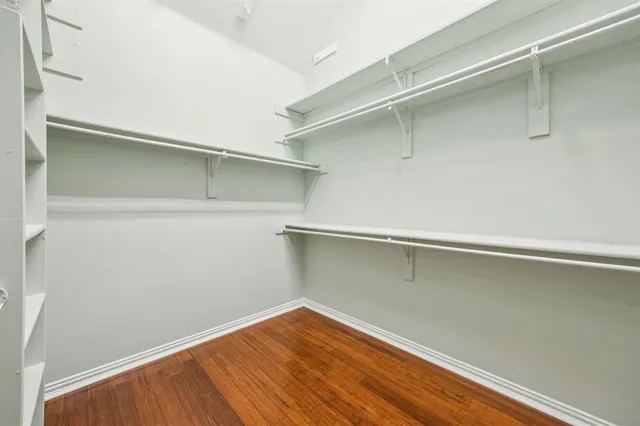 a view of an empty walk in closet