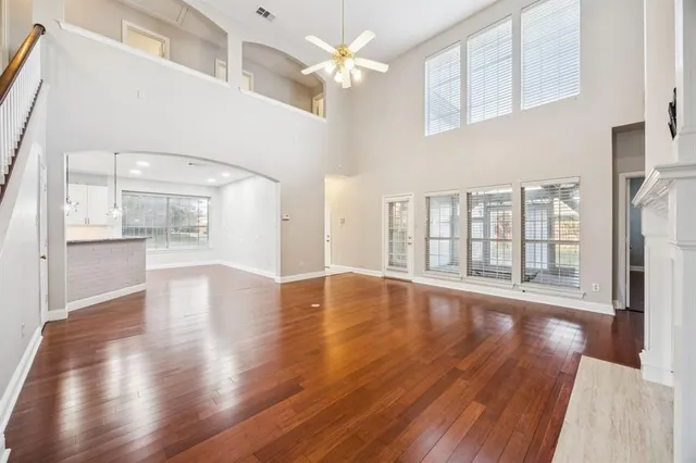 a view of an entryway with wooden floor