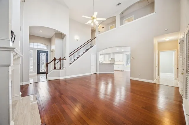 a view of an entryway with wooden floor