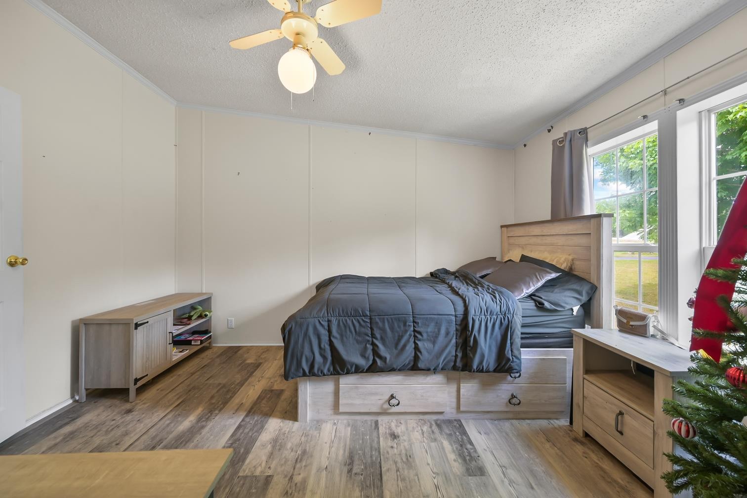 6439 Cedar Grove Road Big Sandy, TN 38221 - Photo 20 of 38 a bedroom with a bed and window