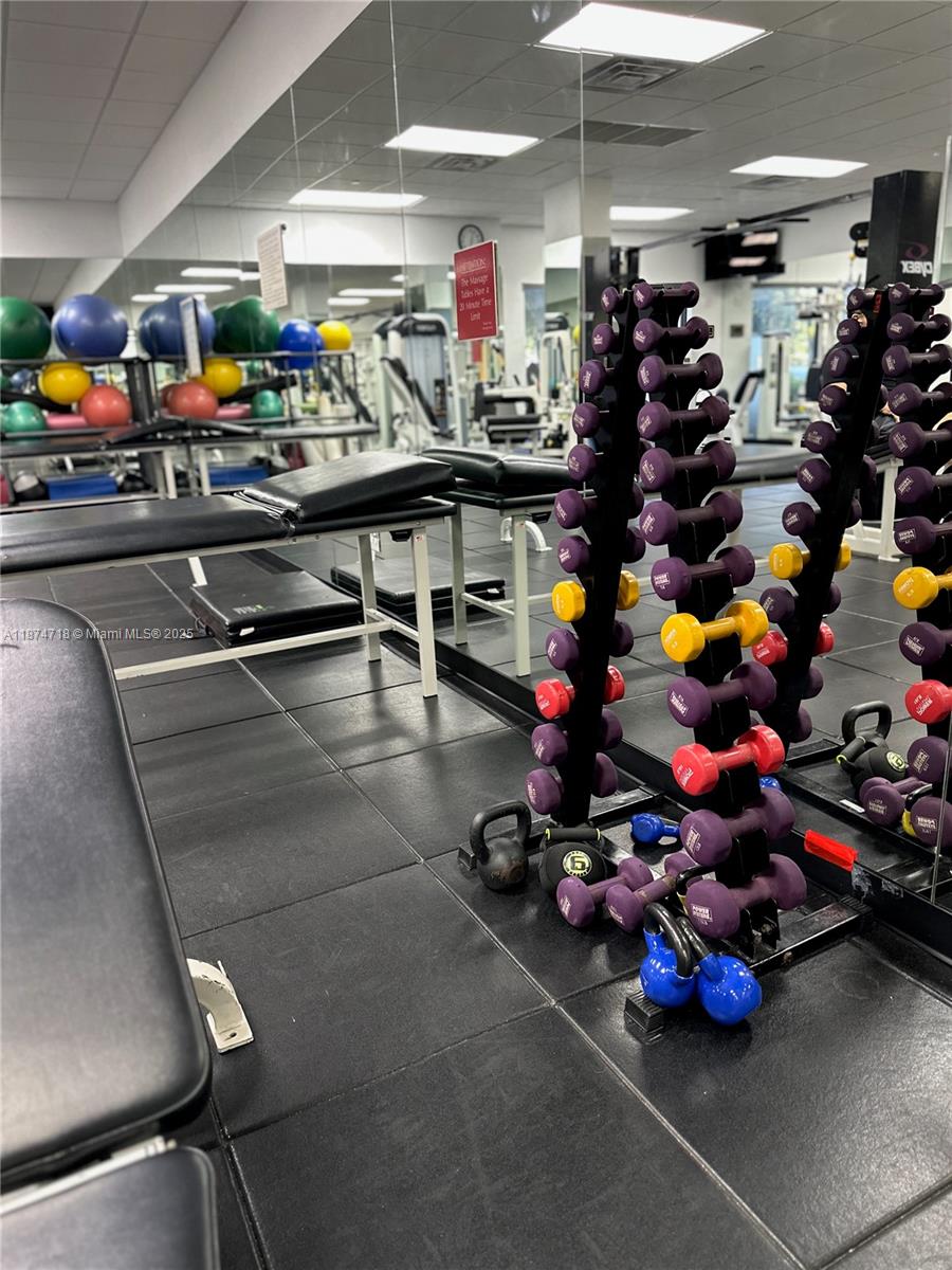 3 Grove Isle Drive, Unit C1108 Miami, FL 33133 - Photo 26 of 30 a room with lots of stuff