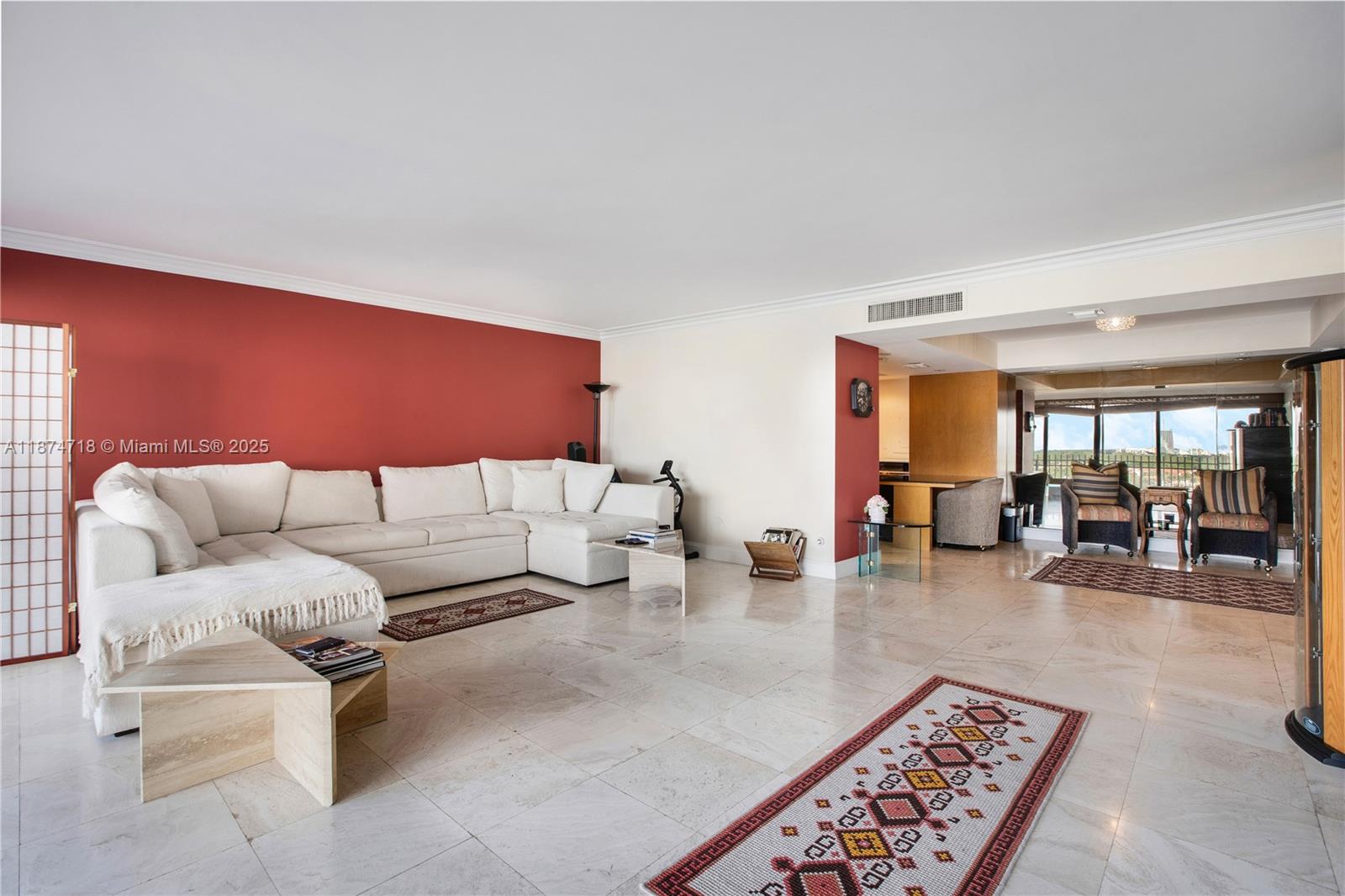 3 Grove Isle Drive, Unit C1108 Miami, FL 33133 - Photo 6 of 30 a living room with furniture and large window