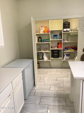 a room with storage and utility