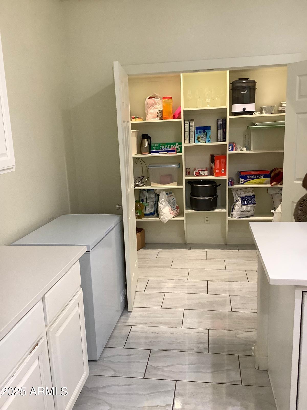 590 South Neely Street Gilbert, AZ 85233 - Photo 6 of 21 a room with storage and utility