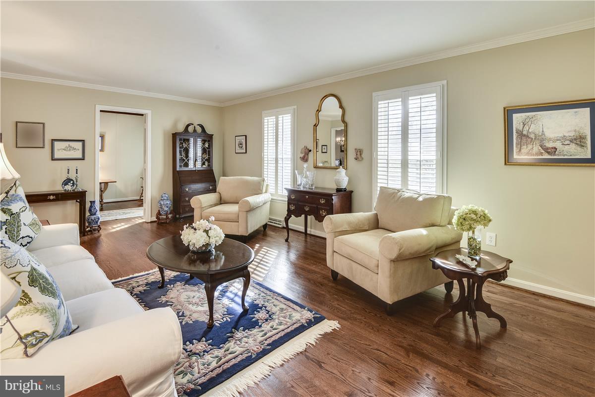 2833 Rifle Ridge Road Oakton, VA 22124 - Photo 2 of 30 Living Room with Hardwood Floors and Crown Molding