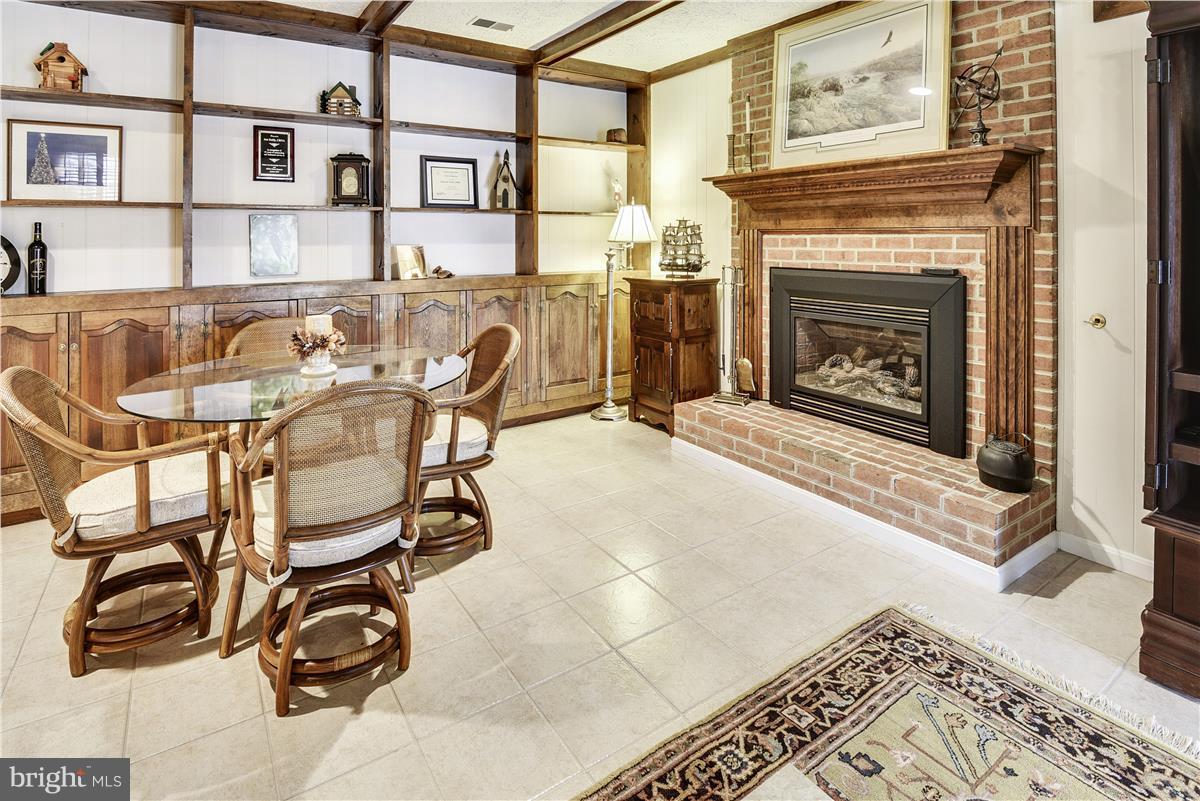 2833 Rifle Ridge Road Oakton, VA 22124 - Photo 21 of 30 Recreation Room with Gas Brick Raised-Hearth Frplc
