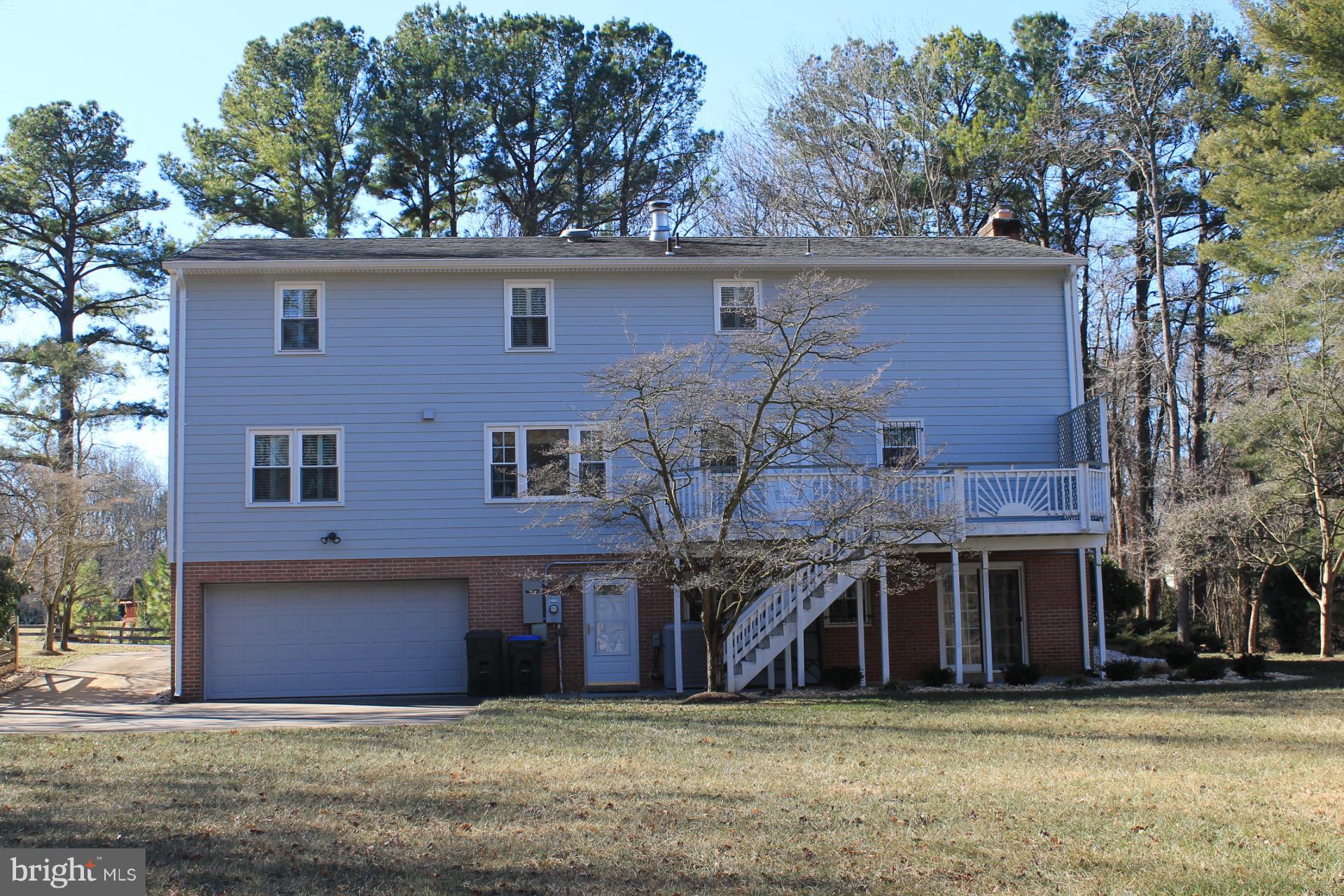 2833 Rifle Ridge Road Oakton, VA 22124 - Photo 26 of 30 Rear of Home with Brick and Hardiplank