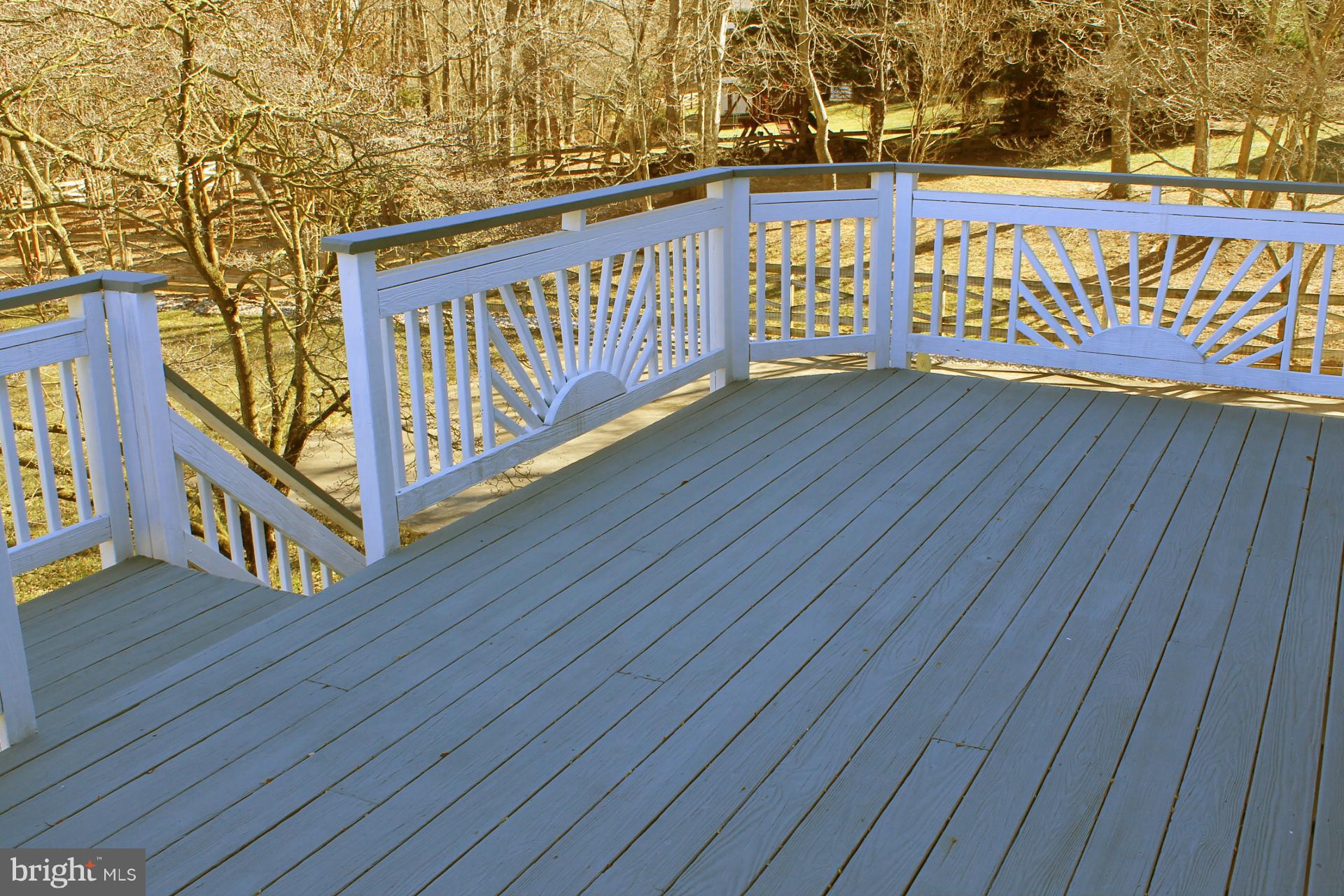 2833 Rifle Ridge Road Oakton, VA 22124 - Photo 27 of 30 Large Deck Overlooking Nearly Half-Acre Lot