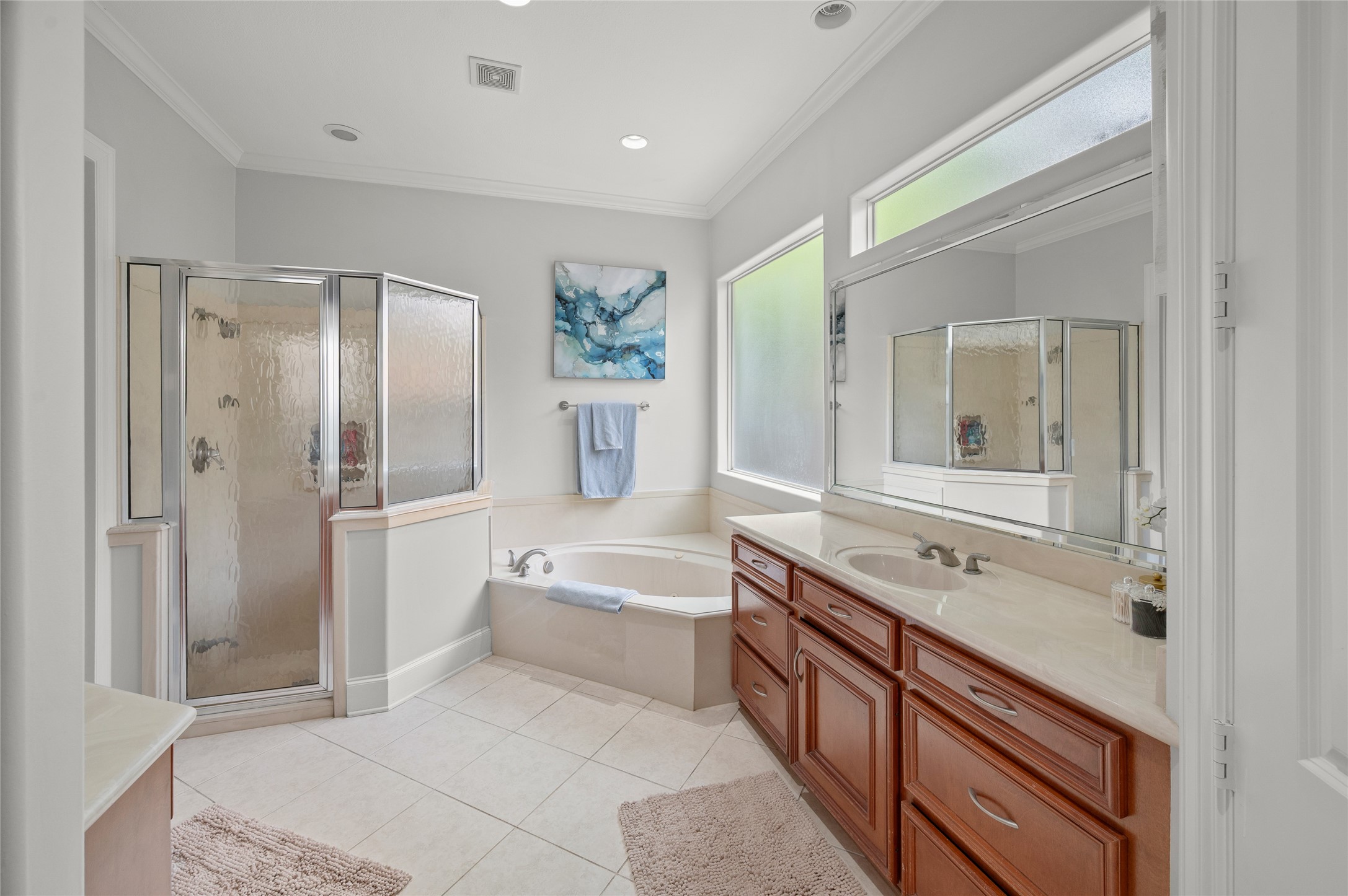 13622 Ashley Run Houston, TX 77077 - Photo 17 of 39 Double vanity, shower and tub in primary bathroom