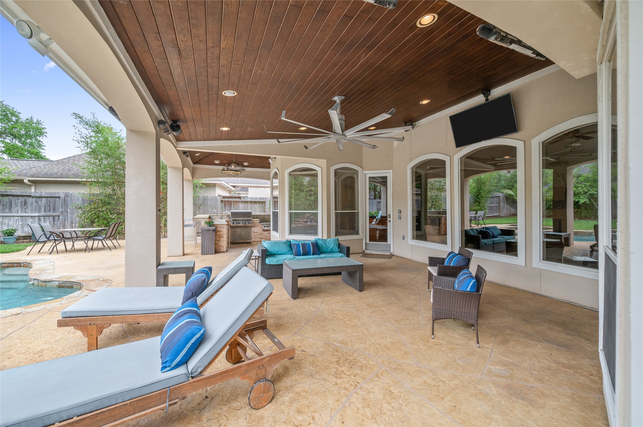 13622 Ashley Run Houston, TX 77077 - Photo 29 of 39 Huge, covered patio with Big A-- Fan brand to move air around on those hot days.