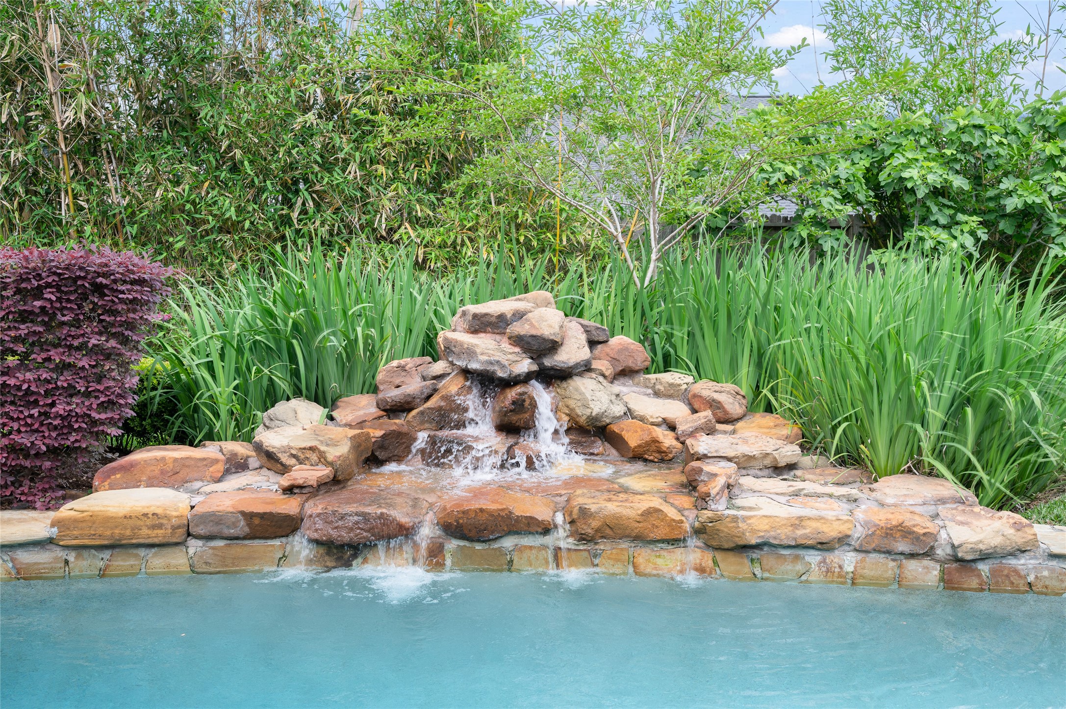 13622 Ashley Run Houston, TX 77077 - Photo 34 of 39 Waterfall provides water movement and serene sounds