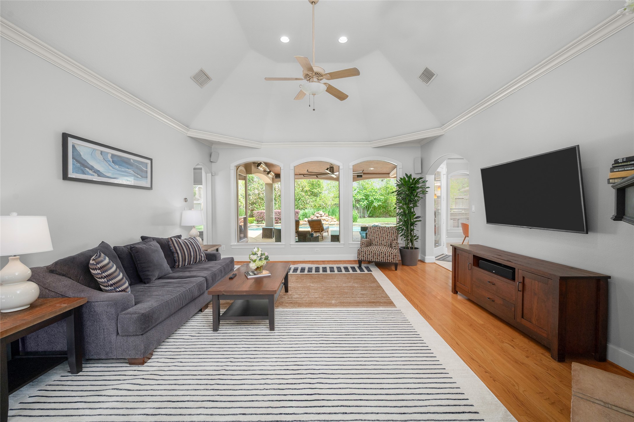 13622 Ashley Run Houston, TX 77077 - Photo 7 of 39 High ceiling with view of the lovely pool and backyard