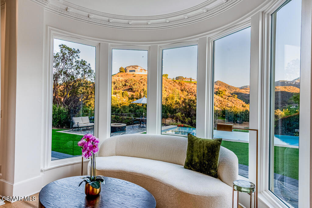 508 West Stafford Road Thousand Oaks, CA 91361 - Photo 11 of 35 a living room with couch and a floor to ceiling window