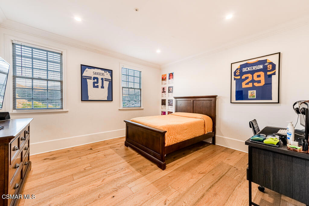 508 West Stafford Road Thousand Oaks, CA 91361 - Photo 16 of 35 a bedroom with a bed and wooden floor