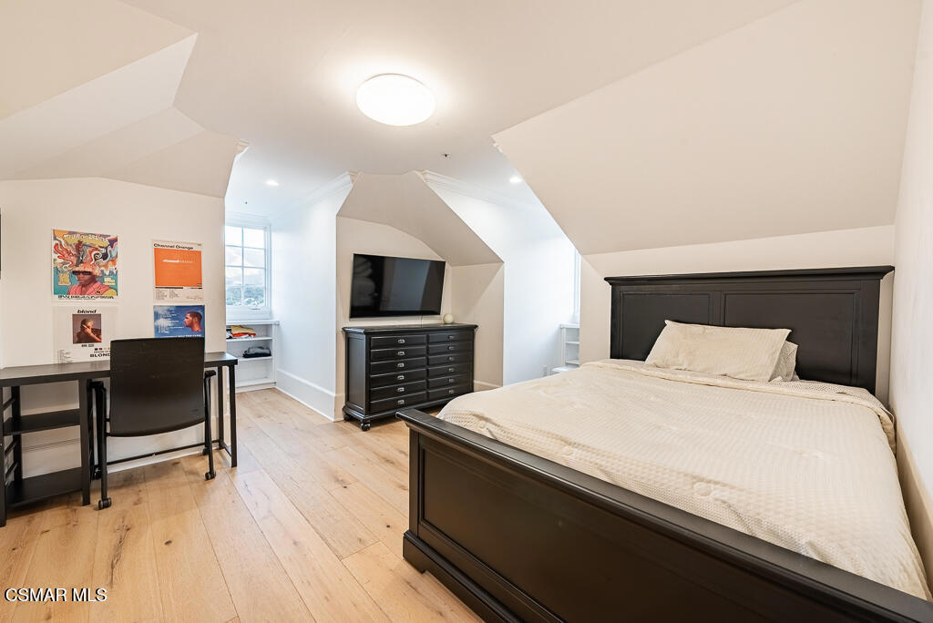 508 West Stafford Road Thousand Oaks, CA 91361 - Photo 17 of 35 a spacious bedroom with a bed and a flat screen tv