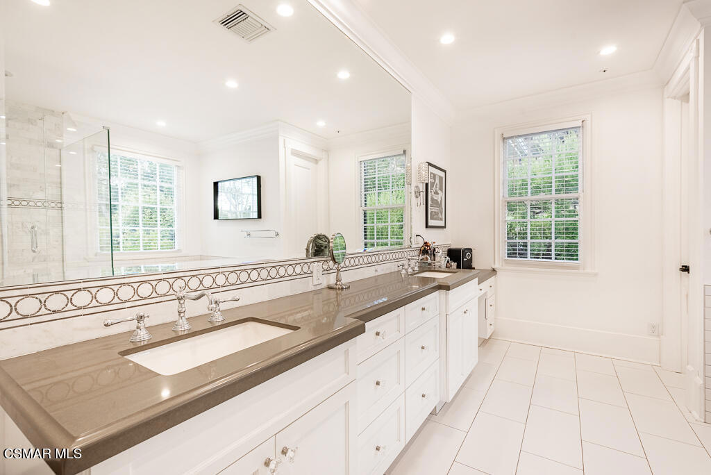 508 West Stafford Road Thousand Oaks, CA 91361 - Photo 26 of 35 a large white kitchen with a sink and large window